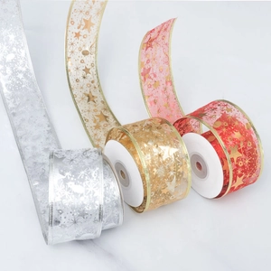 Double-layered bronzing star and music note organza ribbons in gold, silver, and red
