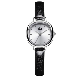 Minimalist Gedi women quartz watch with black leather strap and silver case on white backdrop