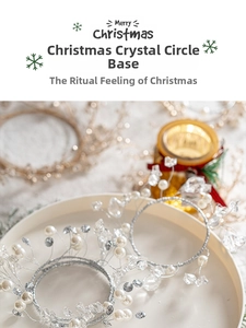 Close-up of silver wire Christmas wreath base with crystals, pearls and beads