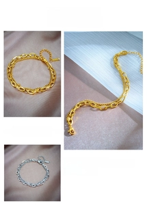 Detail of double-layer titanium steel bracelet showing lobster clasp and S.STEEL tag