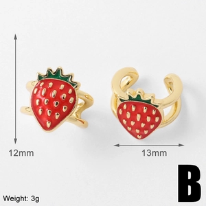 Detailed view of gold-plated strawberry ear cuff with red enamel and 12mm size markings