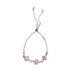 Elegant silver flower charm bracelet with clover motifs and adjustable drawstring closure