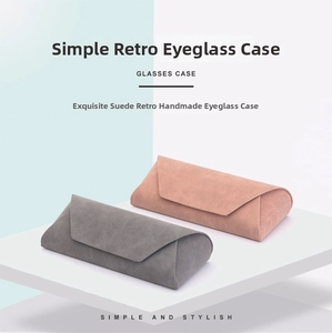 Detail view of handmade envelope glasses cases in grey and pink nubuck PU leather
