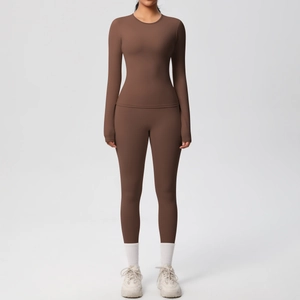 Set da yoga marrone senza cuciture con top a maniche lunghe e leggings a vita alta