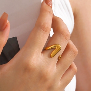 Chic 18K gold plated V-shaped adjustable stainless steel ring for women in close-up shot