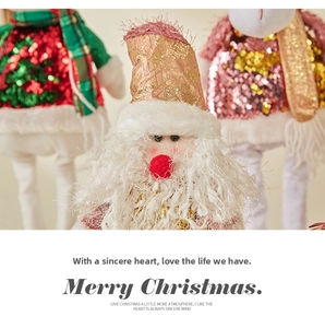 Macro view of Christmas doll details with sequins and plush fabric textures