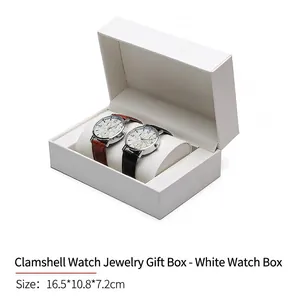 Detail view of flip-top white jewelry box with two slots and curved watch pillows