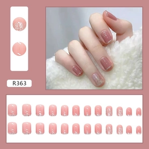 Short square press-on nails set with pink blush and silver glitter gradient finish