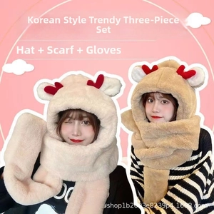 Detail view of winter plush hood with scarf and gloves featuring cute deer antlers