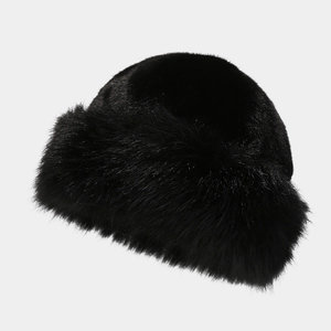 Close-up of the dense black faux fur texture and long fluffy brim of this winter bucket hat