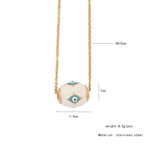 Detail view of heart necklace with dimensions 40+5cm and blue eye bead pendant size 1.5x1cm