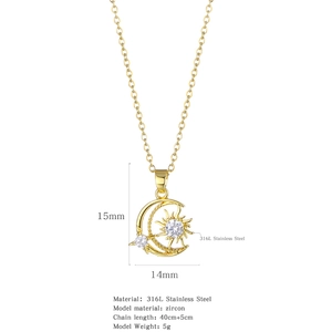 Detail view of celestial moon and sun pendant in 316L stainless steel with zircon stones
