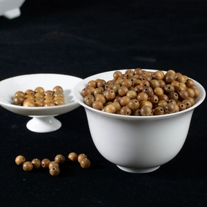 Green sandalwood 6-8mm round beads in white ceramic bowls for DIY jewelry making