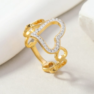 Gold hollow heart ring with crystal inlay and minimalist stainless steel band design