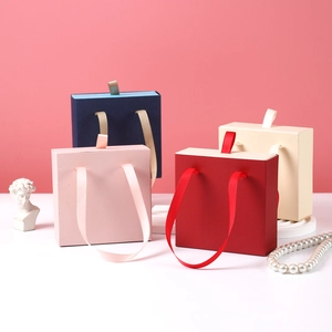 Modern jewelry gift box set with silk handles in pink, red, navy and beige colors