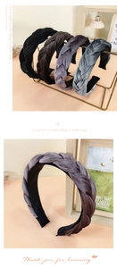 Close-up of velvet braided headbands in black, dark brown, purple, and smoky grey colors