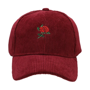 Corduroy baseball cap in burgundy featuring delicate rose embroidery for a stylish look