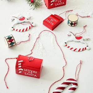 Red and white festive iron Christmas tree ornaments with rocking horse and candy cane