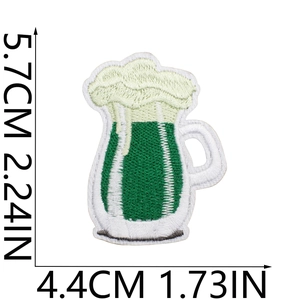 Detail view of a green beer mug embroidered patch with dimensions 5.7cm x 4.4cm