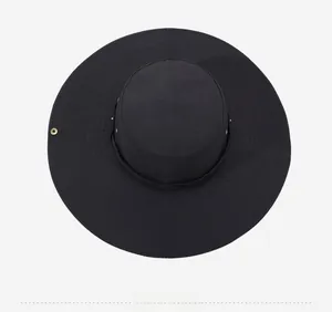 Top view of black wide brim sun hat with metallic eyelets and side snap buttons