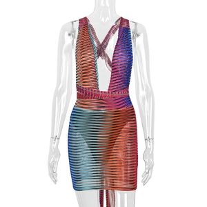 Detail of colorful striped halter neck mini dress with deep V-neck and bodycon fit