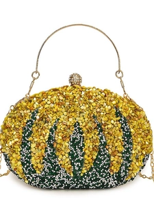 Elegant pumpkin-shaped evening clutch bag with yellow and green crystals and metal handle