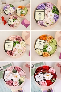 Detail view of soap flower gift set with scented candle in multiple vibrant colors