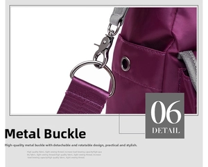 Detail of durable silver swivel hook and purple nylon strap on a travel tote bag