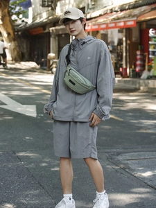 Gray casual chest bag and crossbody waist pack for urban streetwear commuting style