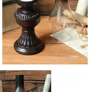 Dettaglio lampada a cherosene vintage in resina con base goffrata e vetro trasparente