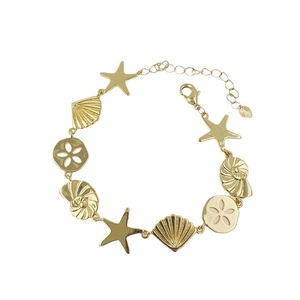 18K gold plated ocean charm bracelet with starfish and seashell pendants on white background