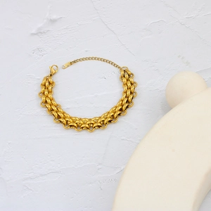 Luxurious 18K gold plated chunky chain bracelet with lobster clasp on white background