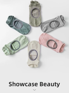 Detail of multi-color cotton yoga socks with breathable mesh and anti-slip grip soles