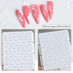 Holographic laser nail stickers with silver floral and script lettering patterns