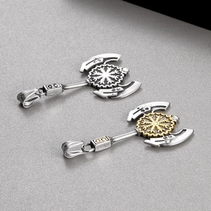 Detail of Viking compass axe pendants in silver and two-tone gold stainless steel finish