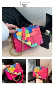 Detail of rose red crossbody bag with vibrant geometric colorful patchwork flap