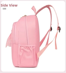 Pink ballet dance backpack for girls showing side pocket and lace detail with zipper