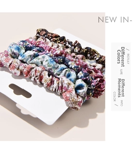 Set of 6 floral scrunchies in various colors displayed on a white product card