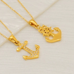 Gold-plated ship anchor and wheel necklace set with sparkling cubic zirconia inlay