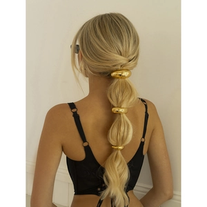Polished 18k gold plated U-shaped metal hair cuffs on ponytail for minimalist style