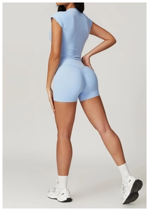 Detail of light blue high-waist yoga shorts with scrunch butt lifting design
