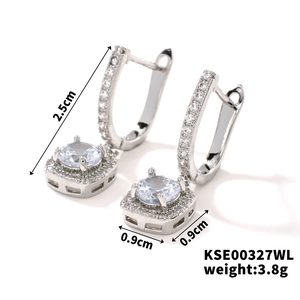 Detail view of silver drop earrings with dimensions 2.5cm height and square zircon pendant