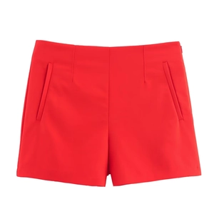 Women's high waisted casual red shorts with side pockets in a stylish minimalist design