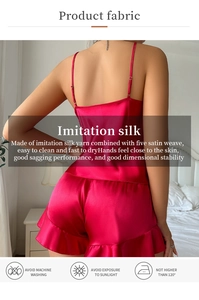 Detailed view of fuchsia silk pajama set with ruffle shorts and lightweight satin texture