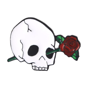 Gothic enamel pin featuring a white skull and red rose design for Halloween styling