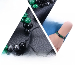 Detail of hand-woven malachite and obsidian bracelet on wrist with gemstone descriptions