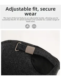 Detail of adjustable metal buckle on back of dark grey wool winter cap for men