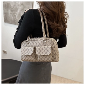 Close-up of retro chain pattern underarm bag with double front flap pockets