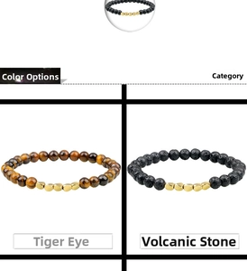 Detail view of tiger eye and black lava stone beaded bracelets with golden spacer beads