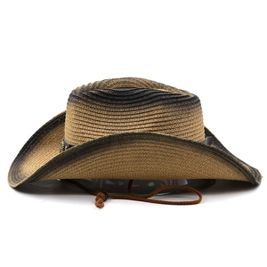 Close-up of a gradient straw cowboy hat with a studded leather belt and woven texture